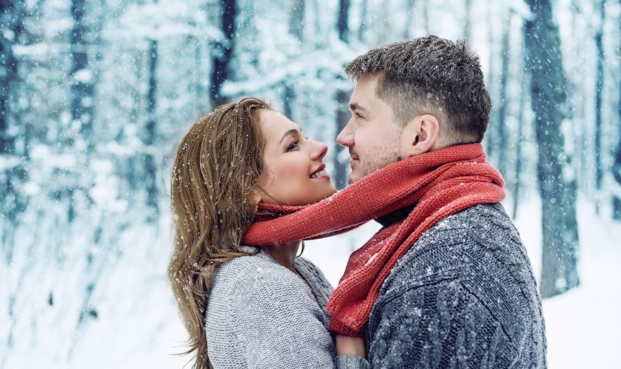 couple wrapped in scarf